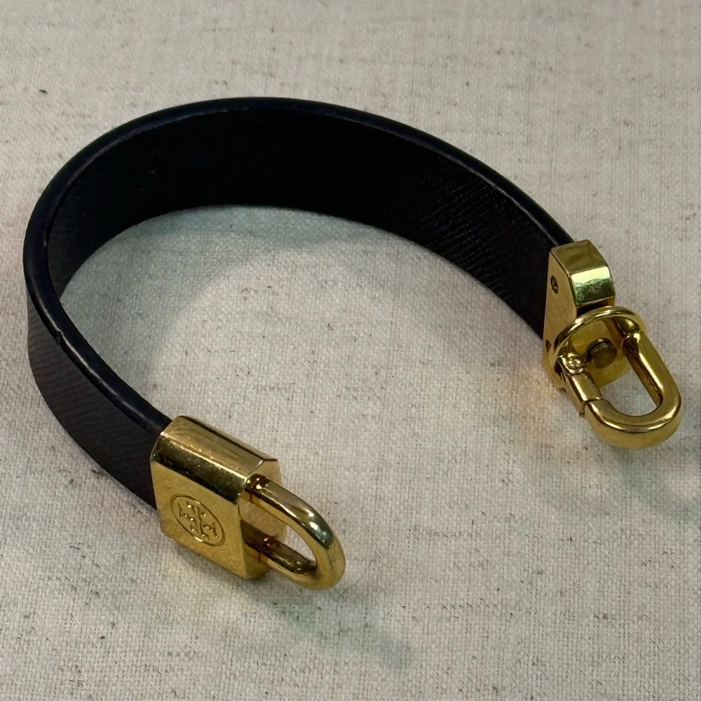 Gold-Tone Lock Bracelet with Black Leather Band
